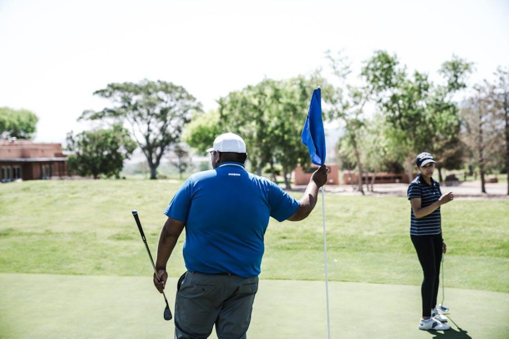 People playing golf