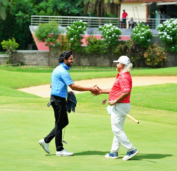 golfers shaking hands