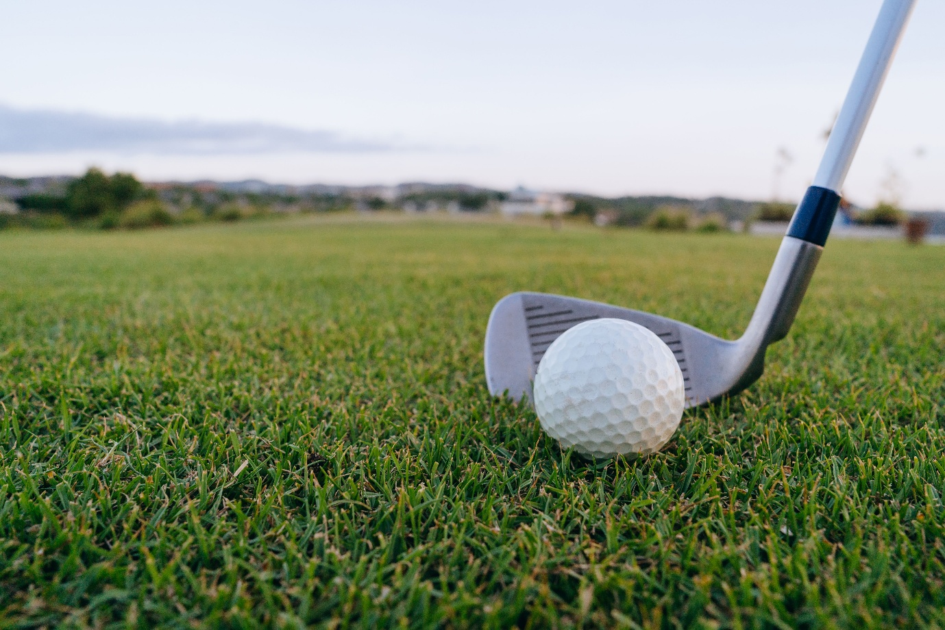 A golf ball and a golf club