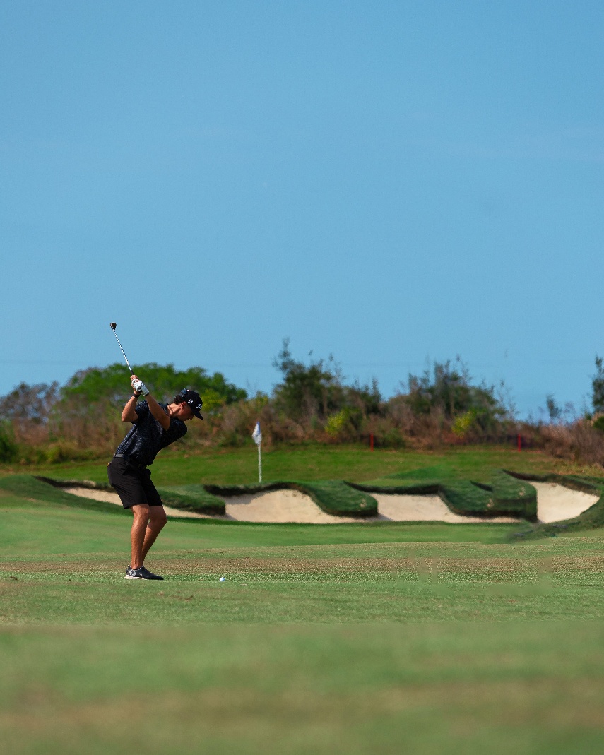 A person playing golf