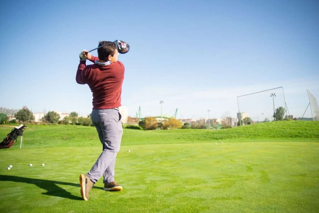 A person playing golf