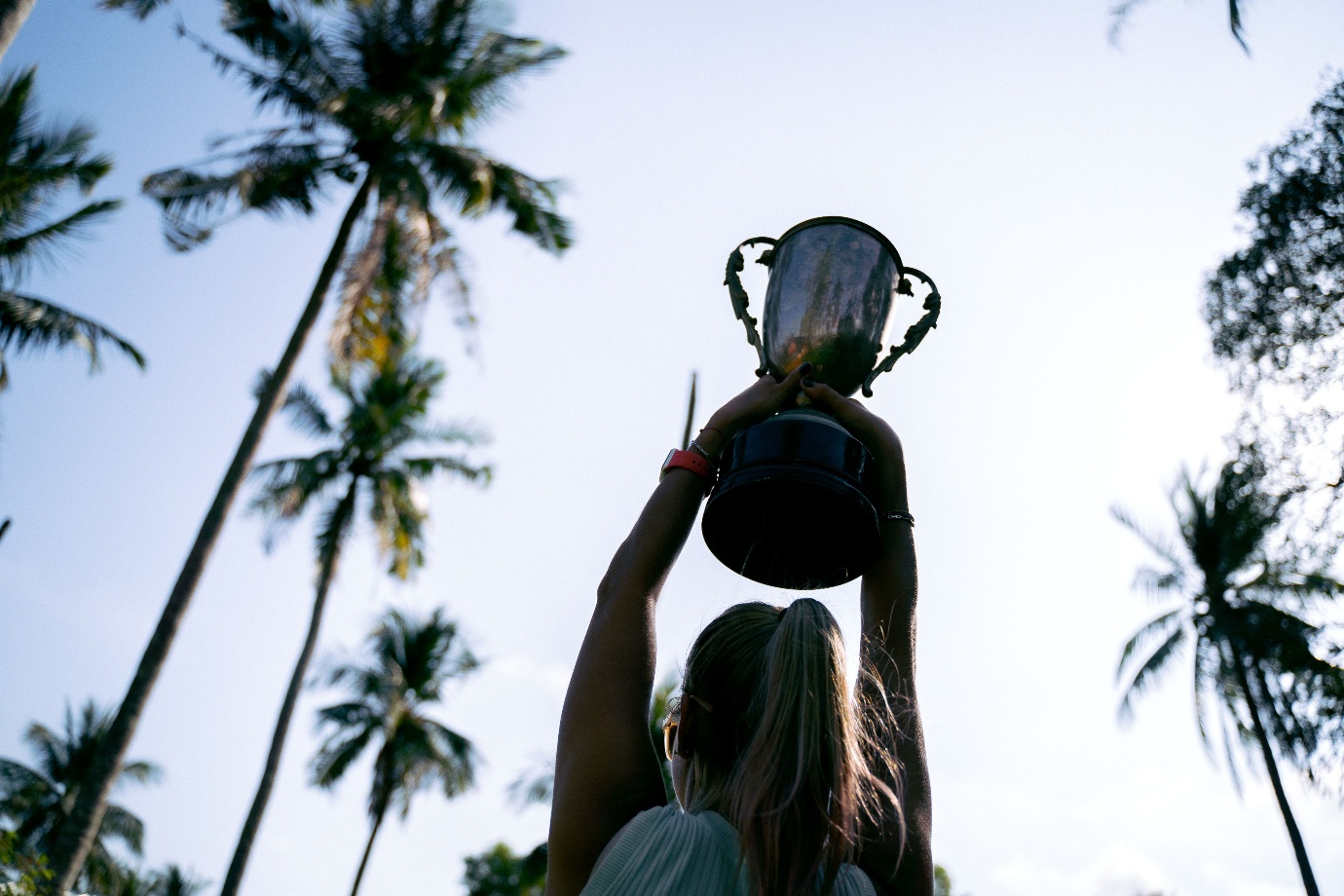 A person holding a trophy