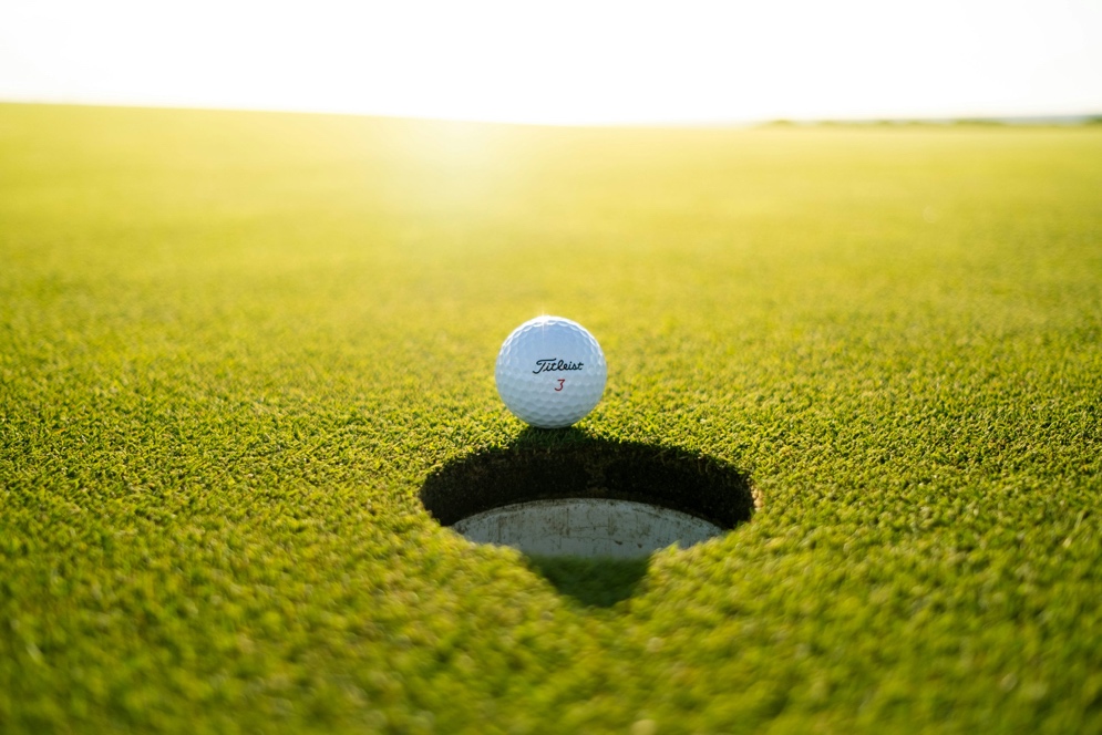 Golf ball near hole