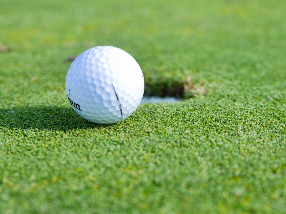 An image of a golf ball on grass