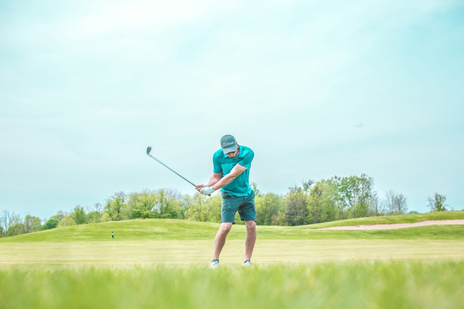 Golfer taking a tournament shot