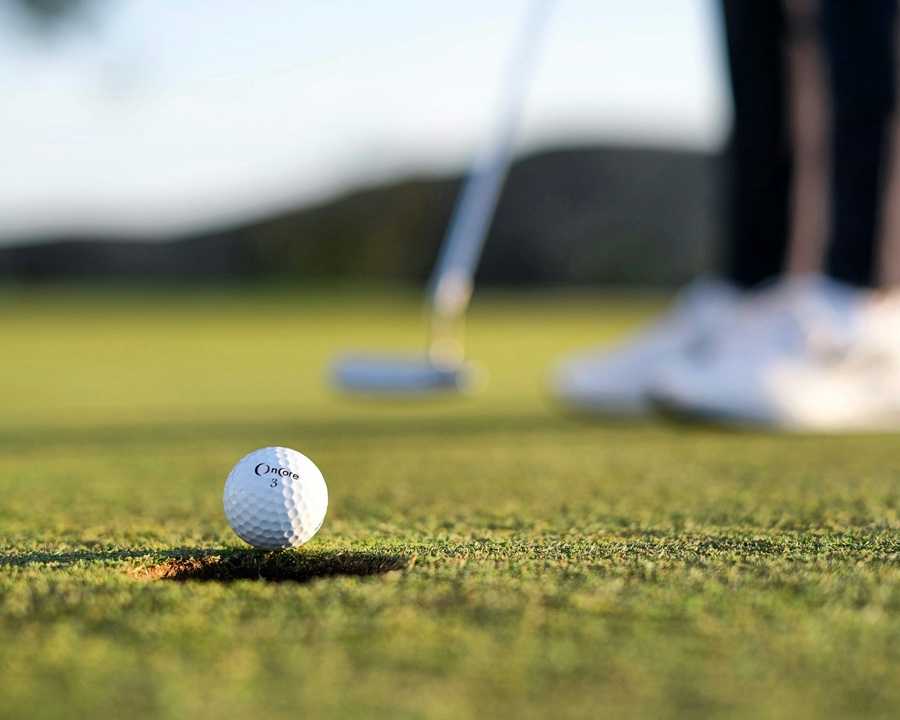 Golf ball on green