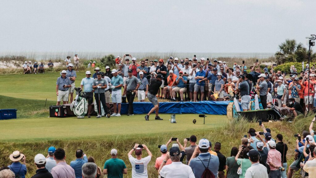 An image of a crowd at a golf tournament