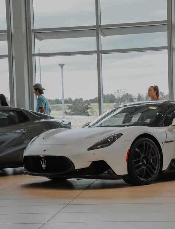 An image of a brand new car at a dealership